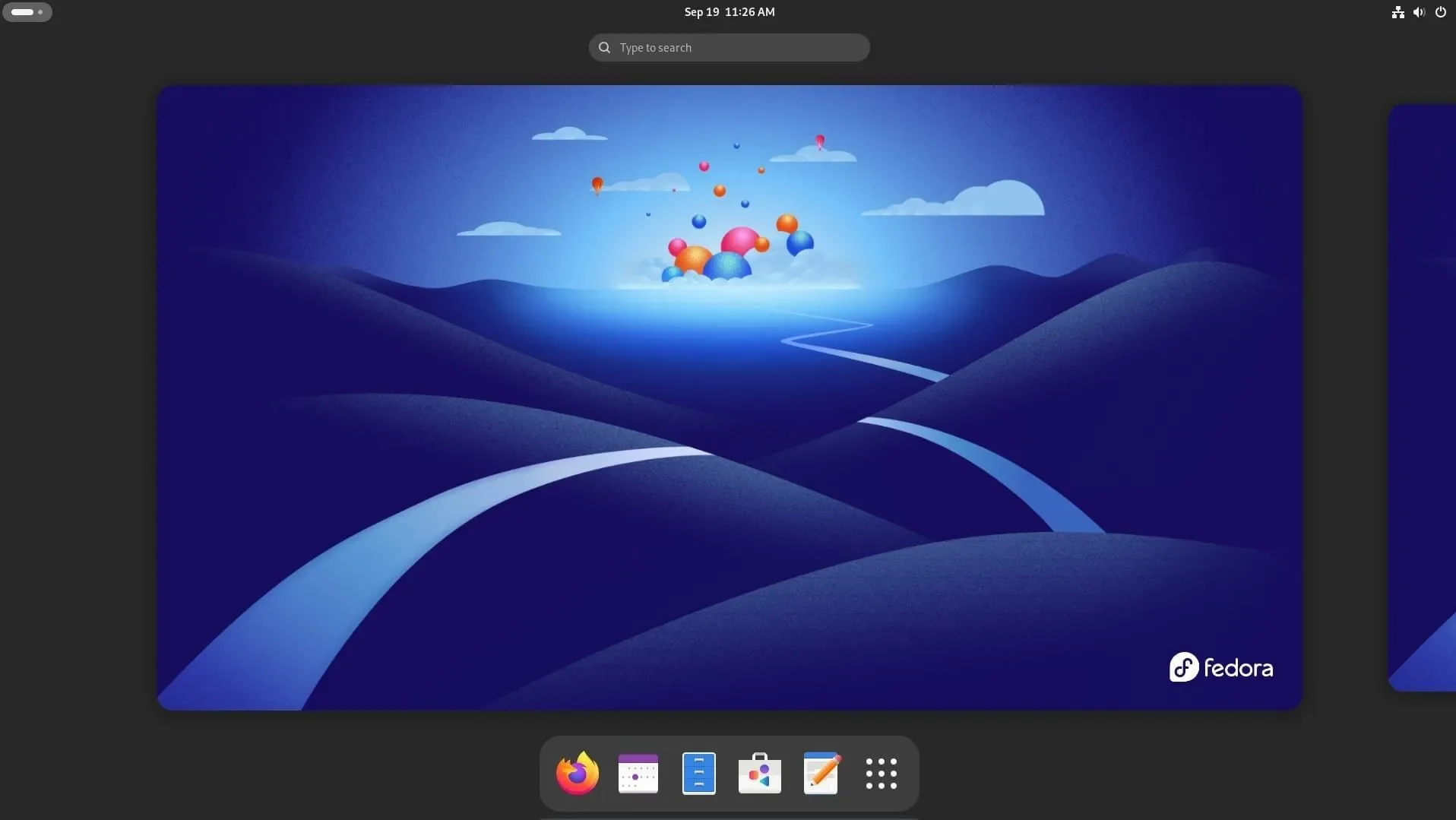 Captura de tela do GNOME 47 com o dock visível e o papel de parede do Fedora 41